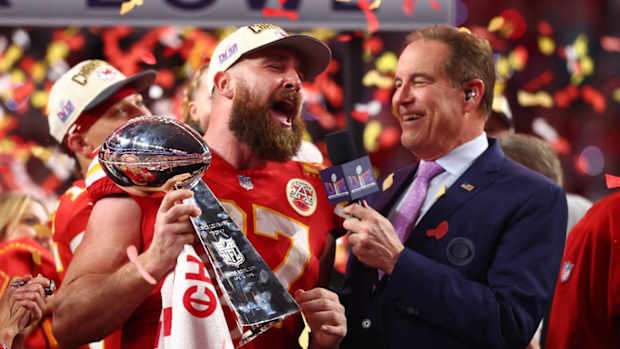 Travis Kelce sings after winning Super Bowl LVIII.